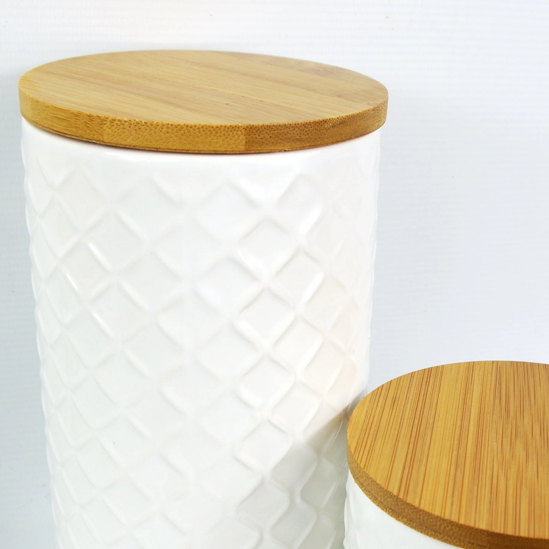 Set of Two Ceramic Jars Embossed Cream Canisters with Lids - Image 3